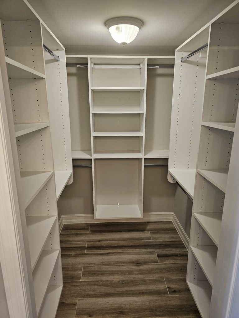 Image of the interior of a large finished walk-in closet