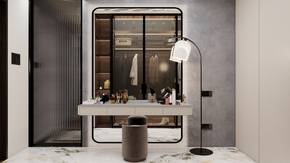 A realistic morning closet scene with a pull-out drawer open at waist height, a visible row of everyday shoes, a hamper beside hanging clothes, a tote bag on a lower shelf, and a small tray holding jewelry and a watch near the dressing area.